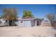 Exterior view of single-story home with large yard and detached structure at 1410 S 24Th Ave, Phoenix, AZ 85009
