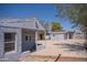 Charming single-story home with a covered porch and spacious concrete driveway at 1410 S 24Th Ave, Phoenix, AZ 85009