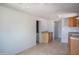Spacious kitchen with modern brown cabinets, and a ceiling fan at 1410 S 24Th Ave, Phoenix, AZ 85009
