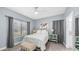Bright bedroom with natural light and a view to the bathroom at 14145 N 92Nd St # 1084, Scottsdale, AZ 85260