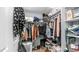 Walk-in closet with shelving and hanging storage space at 14145 N 92Nd St # 1084, Scottsdale, AZ 85260