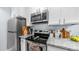 Well-equipped kitchen with stainless steel appliances, granite counters, and ample cabinet space at 14145 N 92Nd St # 1084, Scottsdale, AZ 85260