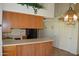 Spacious kitchen featuring modern appliances, ample cabinet space, and convenient breakfast bar at 14626 N 40Th Way, Phoenix, AZ 85032