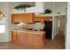 Bright kitchen with neutral cabinets, and tile floors at 14626 N 40Th Way, Phoenix, AZ 85032