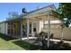 Exterior view of the home featuring a covered patio and outdoor seating area at 14626 N 40Th Way, Phoenix, AZ 85032
