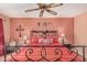 Comfortable bedroom with a ceiling fan and decorative wall art at 1473 Leisure World --, Mesa, AZ 85206
