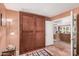 Entryway with a pull down bed, tiled floor and view into the living room at 1473 Leisure World --, Mesa, AZ 85206