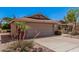 Cozy single-level home with desert landscaping, mature trees, and a two-car garage at 1473 Leisure World --, Mesa, AZ 85206