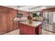 Gourmet kitchen with stainless steel appliances and a center island at 1473 Leisure World --, Mesa, AZ 85206