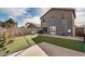 Backyard featuring artificial turf, a playset, and a patio at 15339 N 148Th Ct, Surprise, AZ 85379