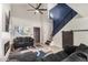 Inviting living room with high ceiling, modern accents, and comfortable seating at 15339 N 148Th Ct, Surprise, AZ 85379