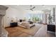 Bright main bedroom with large windows, seating area, and modern finishes at 15427 E Firerock Country Club Dr, Fountain Hills, AZ 85268