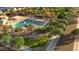 Aerial view of community park with playground, pool, and green space at 15642 W Georgia Dr, Surprise, AZ 85379