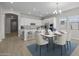 Bright kitchen with a large island and stainless steel appliances at 15642 W Georgia Dr, Surprise, AZ 85379