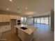 Open-concept kitchen featuring an island with a sink, and stainless steel appliances at 15642 W Georgia Dr, Surprise, AZ 85379