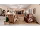 Inviting living room with plush seating, entertainment center, and neutral decor at 16240 W Talara Way, Surprise, AZ 85374