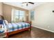 Comfortable bedroom features hardwood floors and bright natural light at 16245 W Papago St, Goodyear, AZ 85338