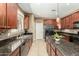 Spacious kitchen with stainless steel appliances, island, and ample counter space at 16245 W Papago St, Goodyear, AZ 85338