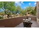 Outdoor balcony featuring seating surrounded by lush desert landscape at 19777 N 76Th St # 1106, Scottsdale, AZ 85255