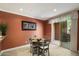 Cozy dining area with seating for four and a view of the backyard at 19777 N 76Th St # 1106, Scottsdale, AZ 85255