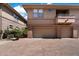 Townhome featuring a 2-car garage and balcony at 19777 N 76Th St # 1106, Scottsdale, AZ 85255