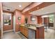 Open concept kitchen with stainless appliances and breakfast bar at 19777 N 76Th St # 1106, Scottsdale, AZ 85255