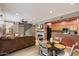 Open living space with dining and living room leading to kitchen at 19777 N 76Th St # 1106, Scottsdale, AZ 85255