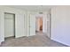 Bedroom featuring neutral carpets, a closet and an ensuite bathroom at 2025 E Campbell Ave # 248, Phoenix, AZ 85016