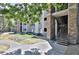 Exterior apartment building with stone accents and landscaping, offering a serene residential setting at 2025 E Campbell Ave # 248, Phoenix, AZ 85016