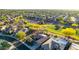 Beautiful aerial view of property nestled in a well-manicured community with a lush golf course nearby at 20558 N 263Rd Dr, Buckeye, AZ 85396