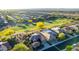Aerial shot of a home near a golf course, showcasing desert landscape and community setting at 20558 N 263Rd Dr, Buckeye, AZ 85396