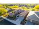 Beautiful aerial shot of a home, showcasing desert landscaping, tiled roof, and proximity to golf course at 20558 N 263Rd Dr, Buckeye, AZ 85396