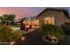 Beautiful backyard with a pool, patio, and lush greenery, perfect for entertaining and enjoying outdoor living at 20558 N 263Rd Dr, Buckeye, AZ 85396
