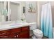 Bathroom features a vanity with a white countertop and a framed mirror at 20558 N 263Rd Dr, Buckeye, AZ 85396