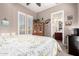 Comfortable bedroom with a cabinet and an ensuite bathroom at 20558 N 263Rd Dr, Buckeye, AZ 85396