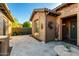 Inviting courtyard with stone pavers, comfortable seating, and stylish decorative accents at 20558 N 263Rd Dr, Buckeye, AZ 85396