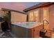 Private hot tub with covered sides for year round enjoyment, plus exterior lighting and privacy at 20558 N 263Rd Dr, Buckeye, AZ 85396