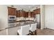 A beautifully appointed kitchen with stainless steel appliances and granite countertops at 20558 N 263Rd Dr, Buckeye, AZ 85396