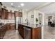 Kitchen with stainless appliances, granite counters, and a center island with seating at 20558 N 263Rd Dr, Buckeye, AZ 85396