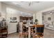 The kitchen is open to the dining and Gathering rooms at 20558 N 263Rd Dr, Buckeye, AZ 85396