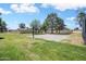 Enjoy a game of basketball on this outdoor court with well-maintained landscaping at 2407 W Rue De Lamour Ave, Phoenix, AZ 85029