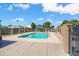Enjoy the community pool with plenty of lounging area and shaded space at 2407 W Rue De Lamour Ave, Phoenix, AZ 85029