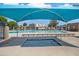 This community offers a pool with a hot tub next to it for residents to enjoy at 2407 W Rue De Lamour Ave, Phoenix, AZ 85029