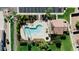 Community pool area with lounge chairs and lush landscaping, offering a relaxing outdoor space at 250 W Juniper Ave # 22, Gilbert, AZ 85233