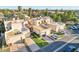 Spacious home with desert landscaping, multiple garages, a private drive, and a tile roof at 250 W Juniper Ave # 22, Gilbert, AZ 85233