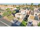 Spacious home with desert landscaping, multiple garages, a private drive, and a tile roof at 250 W Juniper Ave # 22, Gilbert, AZ 85233