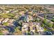 Aerial view of the community highlighting landscaping, parking, and common areas at 250 W Juniper Ave # 22, Gilbert, AZ 85233
