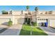 Inviting home featuring desert landscaping, multiple garages, and a private drive at 250 W Juniper Ave # 22, Gilbert, AZ 85233