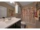 Bathroom featuring a vanity with a dark cabinets and a shower/tub combination at 30446 W Picadilly Rd, Buckeye, AZ 85396