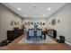 Stylish dining room with modern decor, a large table, and seating for six at 30446 W Picadilly Rd, Buckeye, AZ 85396